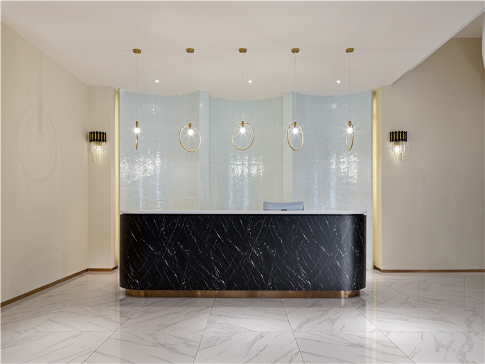 低調(diào)奢華風(fēng)羽妃醫(yī)療美容醫(yī)院大廳接待吧臺裝修設(shè)計實景圖 低調(diào)奢華風(fēng)羽妃醫(yī)療美容醫(yī)院大廳接待吧臺裝修設(shè)計實景圖